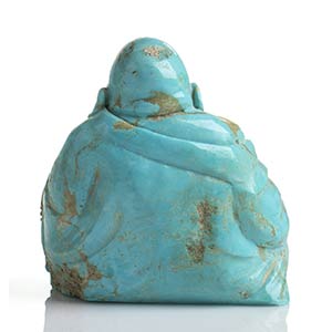 A turquoise sculpture depicting a ... 