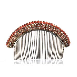 A coral comb tiara decorated with ... 