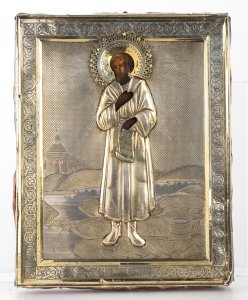 Russian icon with silver oklad of a saint - ... 
