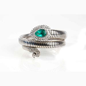 Diamonds and emerald snake tubogas bracelet; ... 