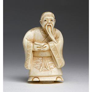 A lot of three ivory carved netsuke - early ... 