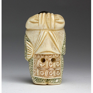 An ivory carved netsuke - early ... 