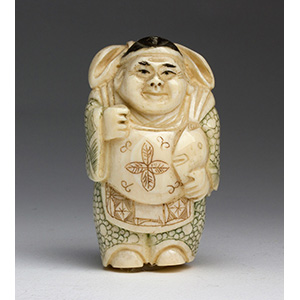 An ivory carved netsuke - early ... 