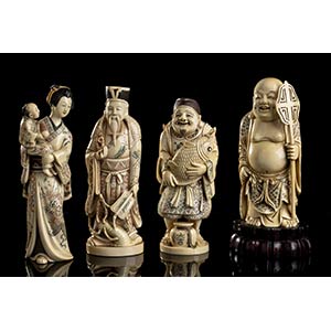 FOUR IVORY SCULPTURES OF ... 
