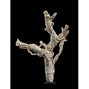 A WHITE CORAL SCULPTURE WITH FEMALE ... 