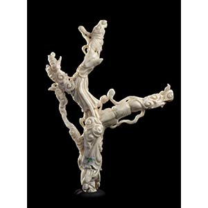 A WHITE CORAL SCULPTURE WITH ... 