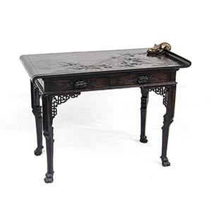 A CHINOISERIE WOOD AND METAL TABLEEurope, ... 