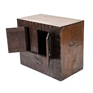 A WOOD AND METAL CHEST, ... 