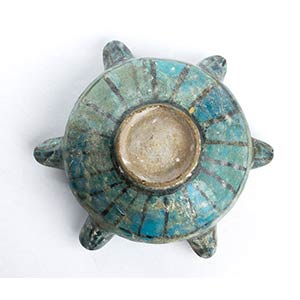 A TURQUOISE-GLAZED MOULDED ... 