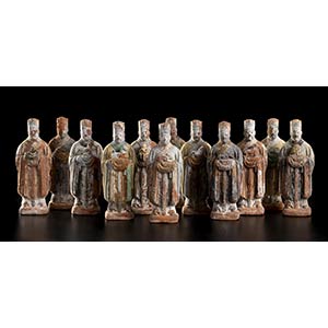 TWELVE PAINTED TERRACOTTA FIGURES WITH THE ... 