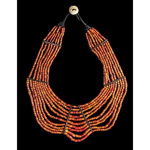 A BREAST NECKLACE WITH ORANGE BEADS50 cm ... 