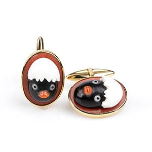 Gold, Cerasuolo coral and onyx cufflinks
18k ... 