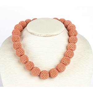 Woven mesh pink coral necklace
18k yellow ... 