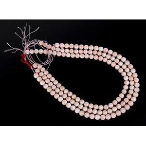 3 loose pink coral beads ... 