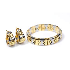 Gold bracelet and earrings - by ... 