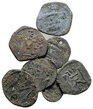 Lot of 7 Byzantine Æ coins (one pierced), ... 