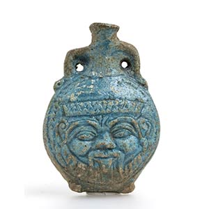Egyptian faiance flask with Bes protome and ... 