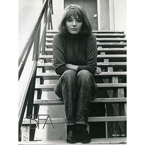 Natalie Wood sitting portrait on stairs. ... 