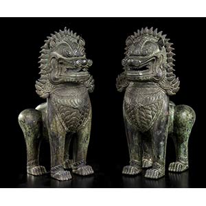 A PAIR OF BRONZE KHMER STYLE BUDDHIST ... 