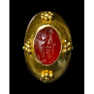 A late roman gold ring set with a carnelian ... 
