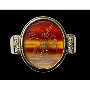 A roman banded agate intaglio mounted on a ... 