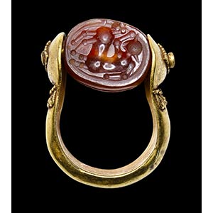 An etruscan agate scarab intaglio set in a ... 