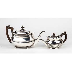 Two English sterling silver tea ... 