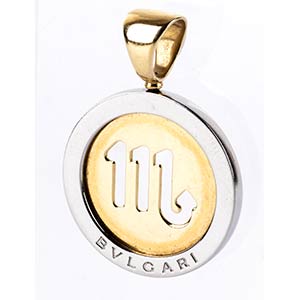 Gold and steel pendant, mark of BULGARI18k ... 