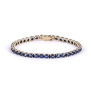 Gold and sapphires tennis bracelet 14k ... 