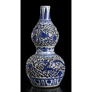 A BLUE AND WHITE AND RETICULATED PORCELAIN ... 