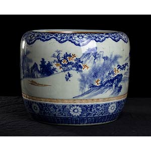 A BLUE AND WHITE PORCELAIN CACHEPOT
China ... 