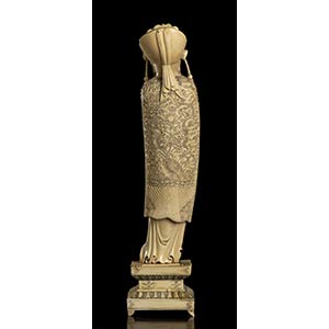 AN IVORY FIGURE OF A DIGNITARY ... 