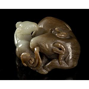 A JADE CARVING OF TWO RAMS
China, ... 