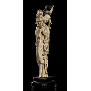 AN IVORY FEMALE FIGURE 
China, ... 