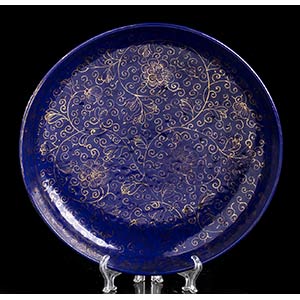 A BLUE GLAZED AND GILT DECORATED ... 
