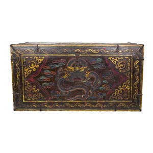 A CARVED AND PAINTED WOOD CHEST
Tibet, 20th ... 