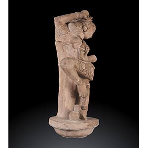 A STONE SCULPTURE WITH A DANCING ... 