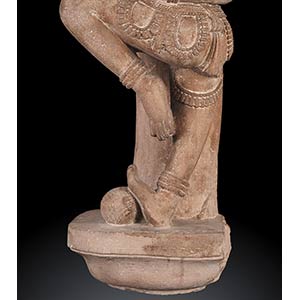 A STONE SCULPTURE WITH A DANCING ... 