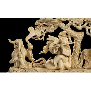 AN IVORY GROUP WITH ... 