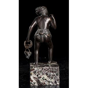 A SMALL BRONZE FIGURE OF A ... 