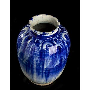 A PAINTED AND GLAZED CERAMIC VASE ... 