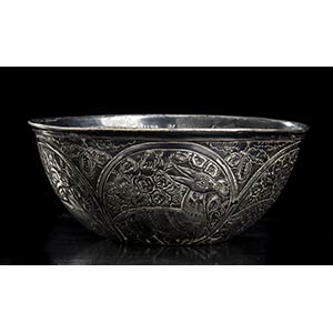 A SILVER BOWL
Iran, 19th century
On the ... 
