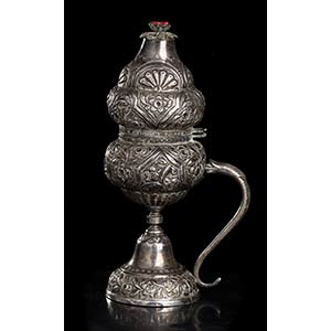 A SILVER CONTAINER AND LID
Iran, Qajar ... 