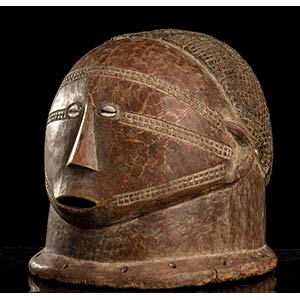 A WOOD AND COWRIE-SHELLS MASK, ... 