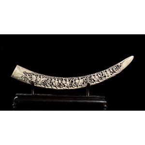 AN IVORY TUSK WITH FIGURES
China, ... 
