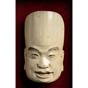 TWO IVORY MASKS
China, early 20th ... 