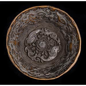 A CARVED DRAGON BOWL
China, ... 