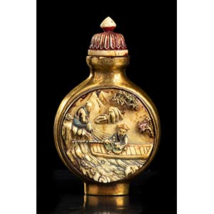 A GILT METAL AND STAINED IVORY SNUFF BOTTLE ... 