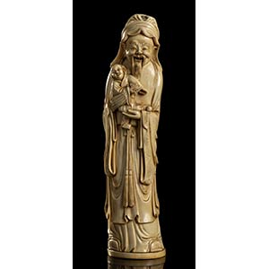 AN IVORY DEITY WITH CHILD
China, early 20th ... 
