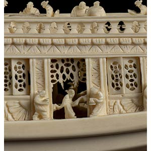 AN IVORY MODEL OF A BOAT WITH ... 